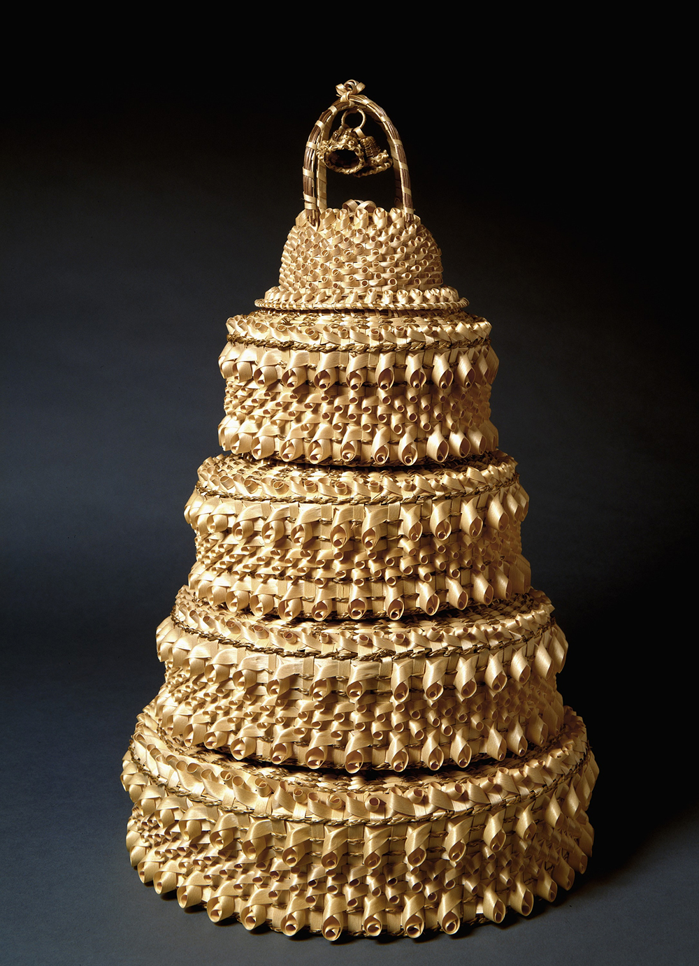 Wedding cake basket by Mary Kawennatakie Adams, 1986. The Smithsonian American Art Museum, Gift of Herbert Waide Hemphill Jr.