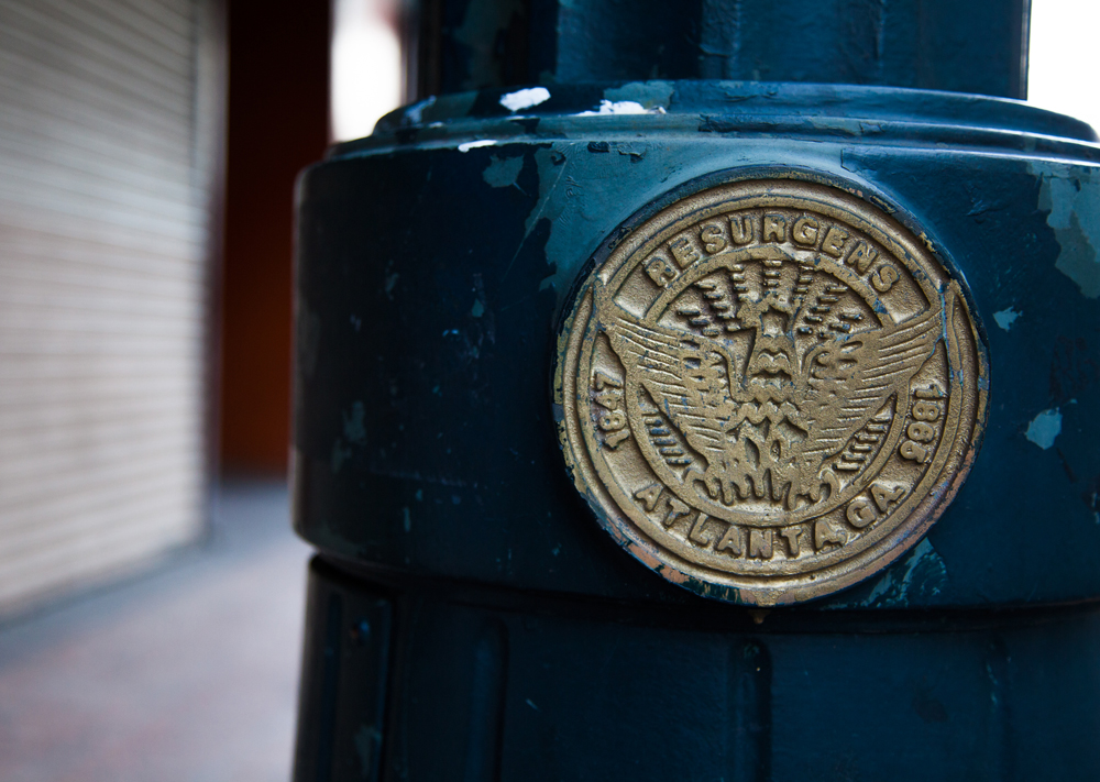 The evocative city seal appears not only on water meter covers, but on many streetlights as well. Photo by Artem Nazarov.