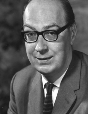 Black and white photograph of English poet and librarian Philip Larkin.