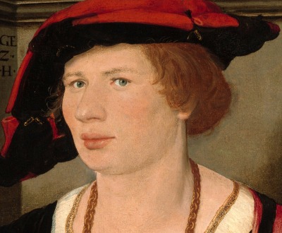 Renaissance youth wearing a hat.