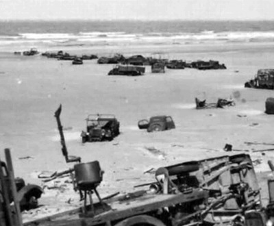 Abandoned British military vehicles on the beach of Dunkirk, France, 1940.