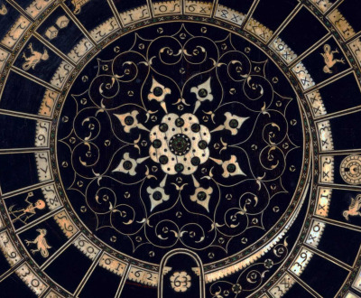 Chess and goose game board, sixteenth century. The Metropolitan Museum of Art. Black game board with circular gold pattern.