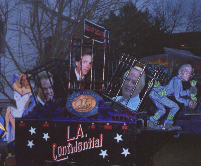 Krewe du Vieux float satirizing Louisiana politicians with legal problems, including former governor Edwin Edwards (second from right) and notorious state representative David Duke (second from left), both in prison at the time, 2003. Photograph by Infrog