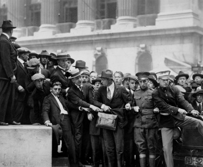Soldiers and police establishing line at door of the Morgan Bank after anti-capitalist Wall Street bombing, September 16, 1920.