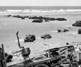 Abandoned British military vehicles on the beach of Dunkirk, France, 1940.