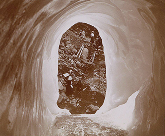 Hikers in the Alps, seen through a hole in the ice, c. 1905–10. Rijksmuseum.