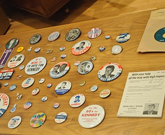 Some campaign buttons for the 1960 presidential election, pitting Senator John F. Kennedy against Vice President Richard Nixon, on display. John F. Kennedy Presidential Library, University of Massachusetts Boston.