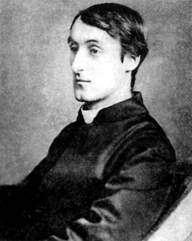 Black and white photograph of English poet and Jesuit priest Gerard Manley Hopkins.