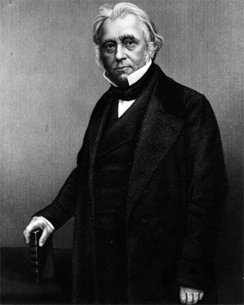 Black and white print of English politician, essayist, and historian Thomas Babington Macaulay.