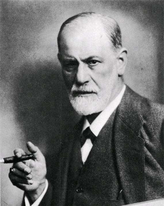 Black and white photograph of Austrian neurologist Sigmund Freud with cigar.