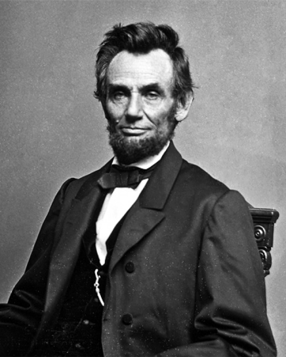 Photograph of President Abraham Lincoln sitting in a chair.