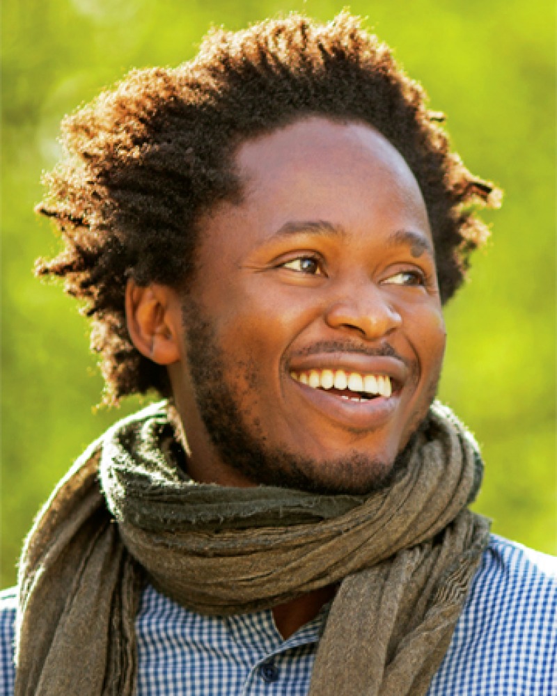 Color photograph of writer and activist Ishmael Beah.