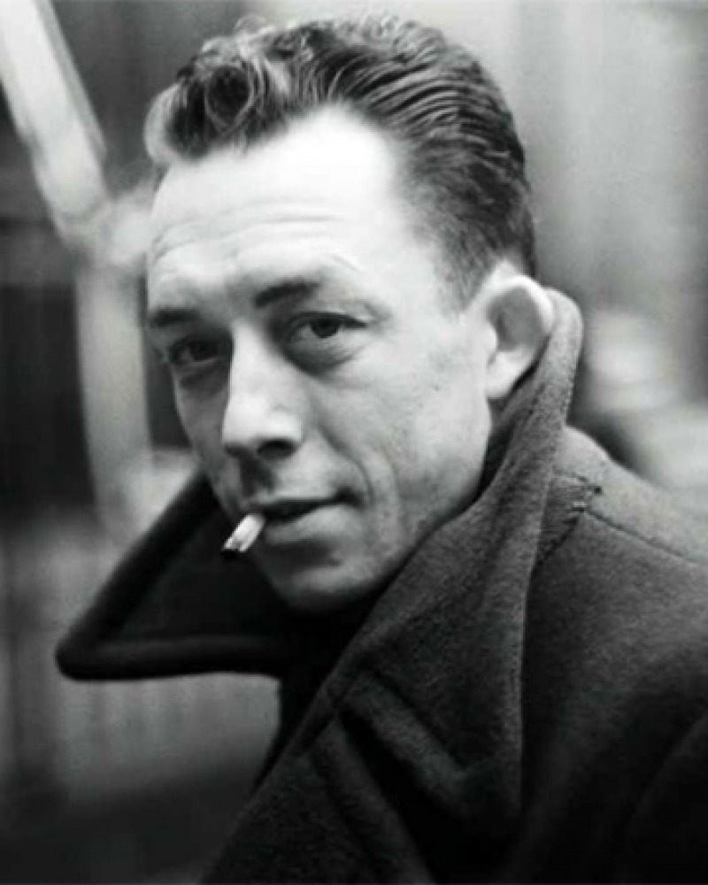 Black and white photograph of French novelist, essayist, and playwright Albert Camus.