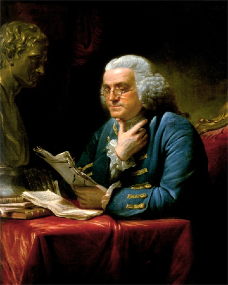 Painting of Benjamin Franklin reading a batch of papers next to a classical bust.