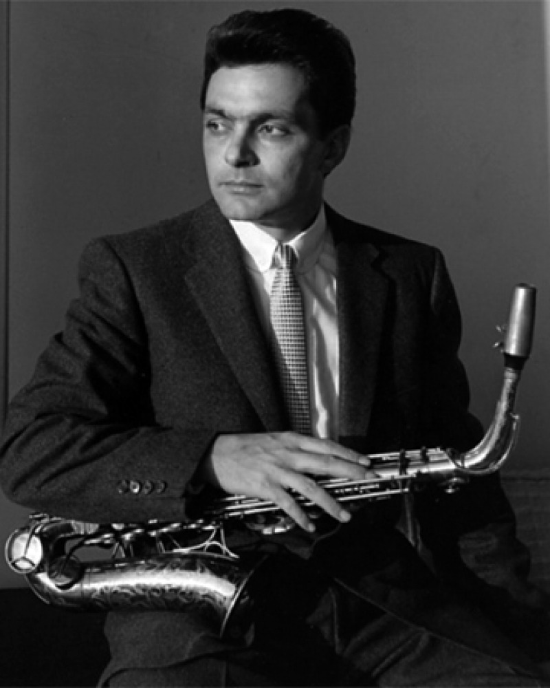 Photograph of American jazz musician Art Pepper with saxophone.