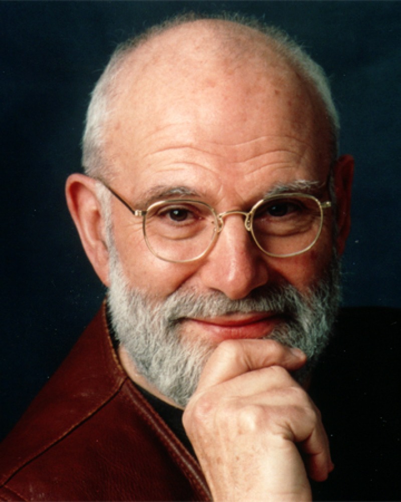Color photograph of Oliver Sacks with a white beard and glasses.