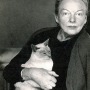 Photograph of American food writer M.F.K. Fisher with cat.