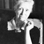 Black and white photograph of American poet Marianne Moore.