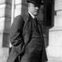 Black and white photograph of former U.S. Attorney General A. Mitchell Palmer with hands in pockets.