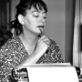 Dorothy Parker working at her typewriter.