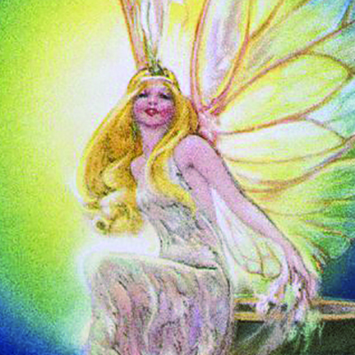 A smiling seated blond woman with wings