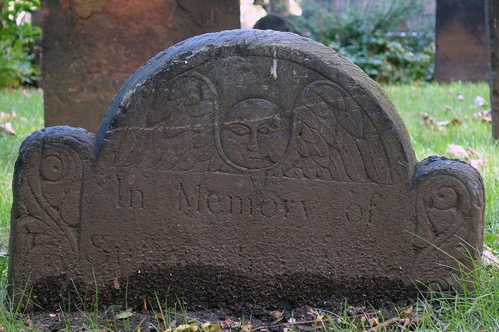 A gravestone at Trinity Churchyard in Manhattan, 2018. Photograph by Allison C. Meier.