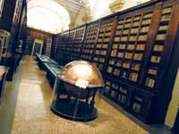 Library room with a large globe in the center