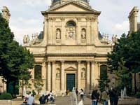 Limestone building with a fountain in front