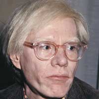 White-haired man with glasses